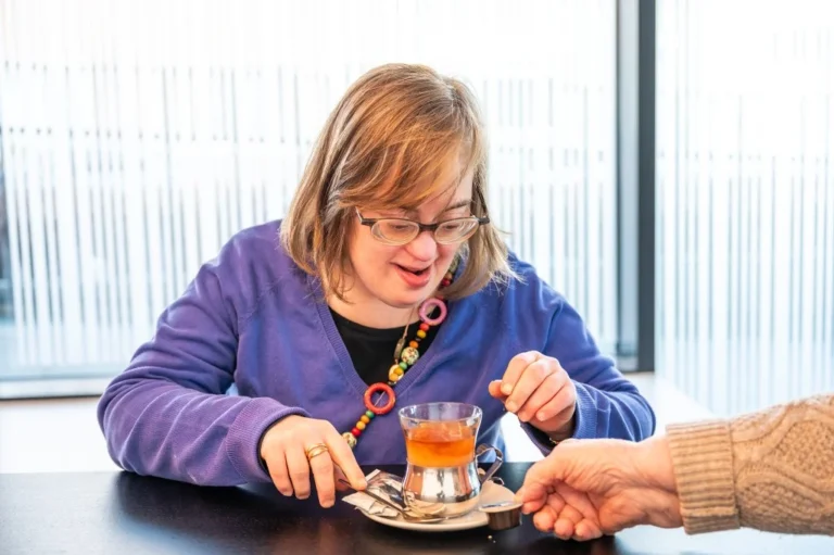 Disabled woman enjoying a cup of tea